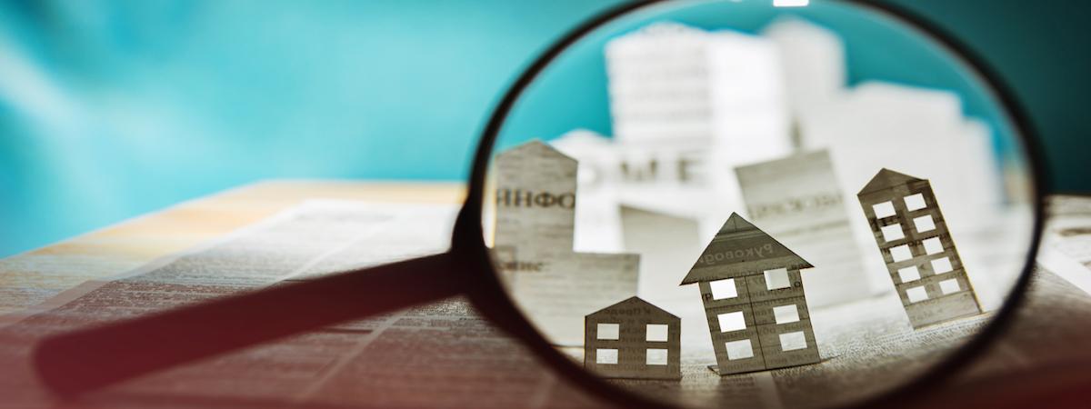 looking at real estate under a magnifying glass