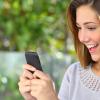 real estate agent taking pictures at new prospect's house